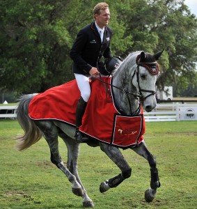 Andre Thieme and Conthendrix make their victory lap after winning the $34,000 Hollow Creek Farm Winning Round at the 2015 Live Oak Internatonal (Photo courtesy of www.PicsOfYou.com)